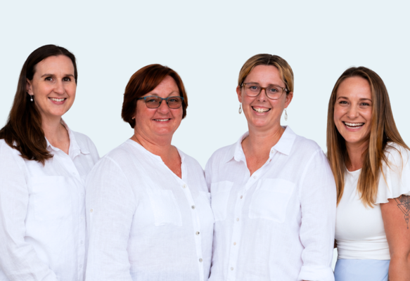 The-Little-Sanctuary-Hervey-Bay-Brisbane The Little Sanctuary team in white shirts on a white background.